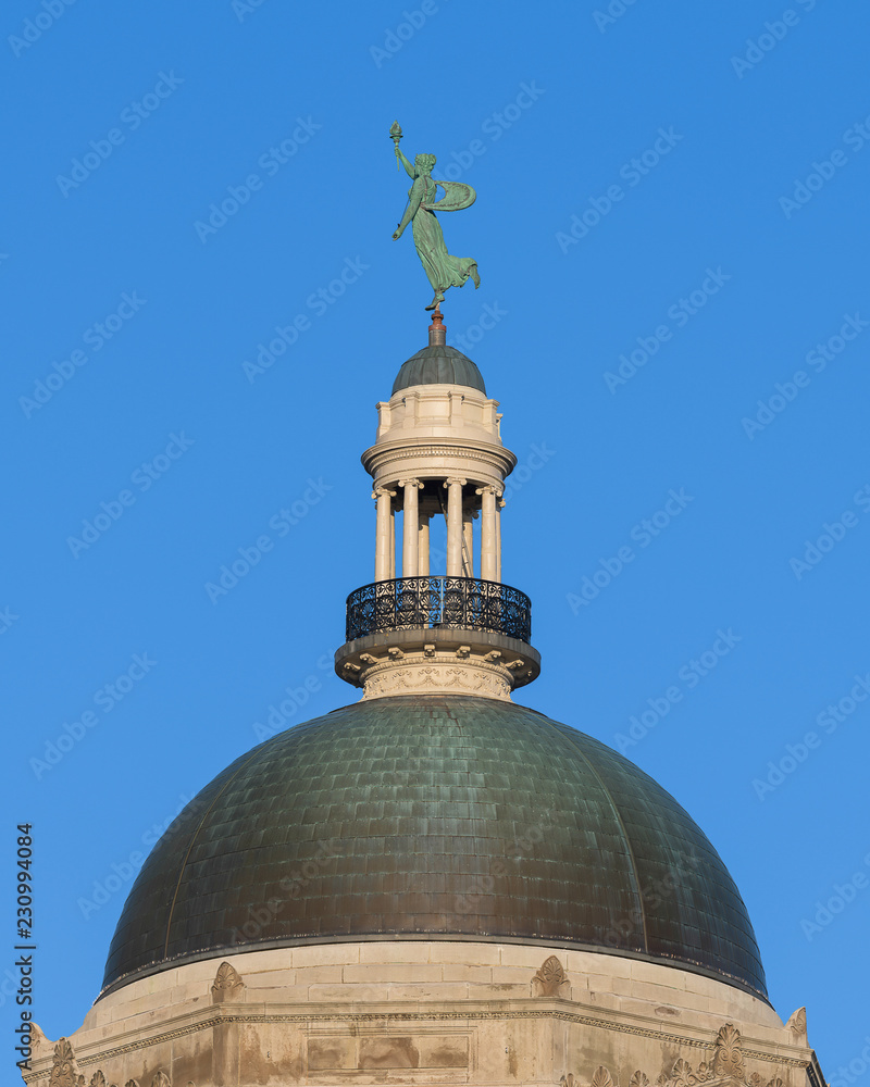 Lady Liberty wind vane on top of the dome of the Allen County Courthouse in Fort Wayne, Indiana