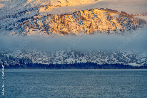 Fototapeta Naklejka Na Ścianę i Meble -  Fog on the lake Markakol. East Kazakhstan.