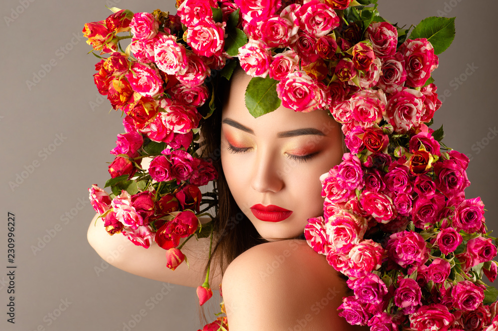 beautiful korean girl with bright makeup and roses on head  