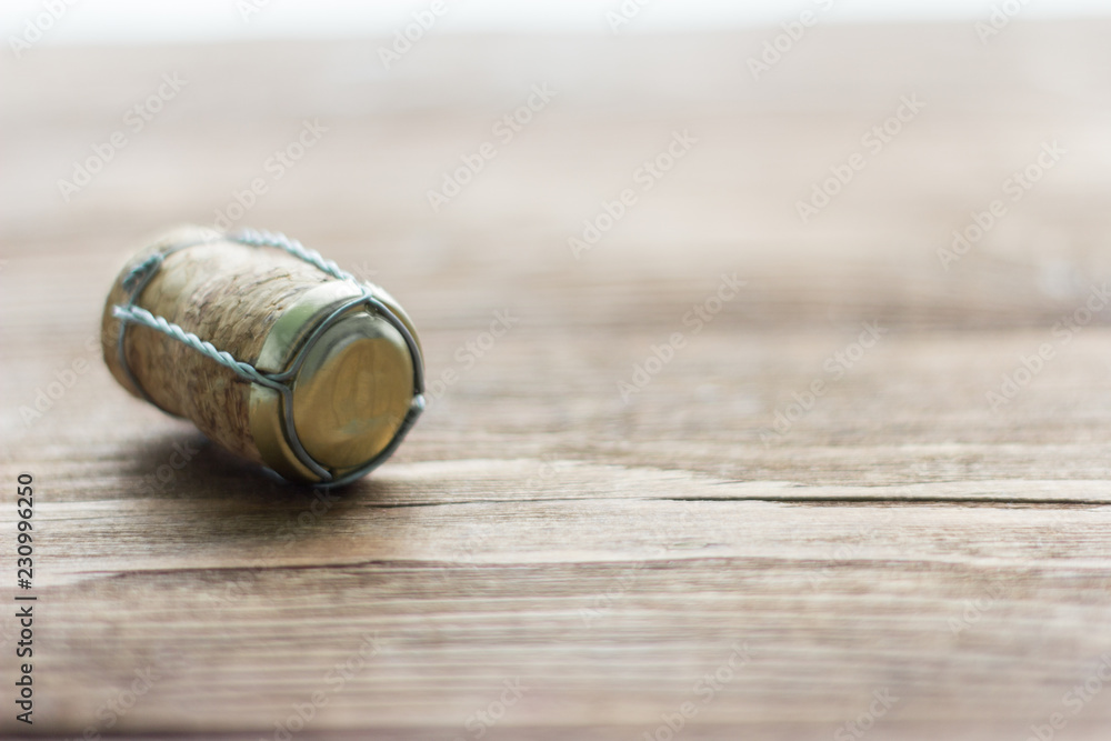 champagne cork on wooden background champagne cork on wooden background