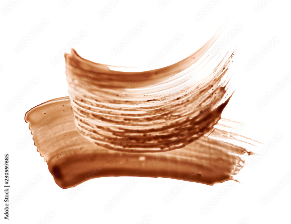Smear of brown mascara for eyelashes on white Smear of brown mascara for eyelashes on white