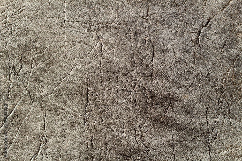 Textured faux leather synthetic background closeup macro Textured faux leather synthetic background closeup macro