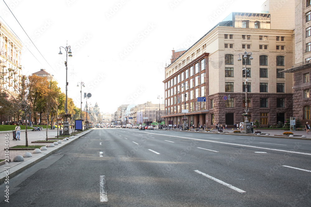 View of road with cars in modern city