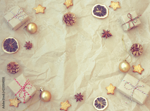 Christmas vintage background, gift box, golden balls, anise, dried orange, cookie star shape