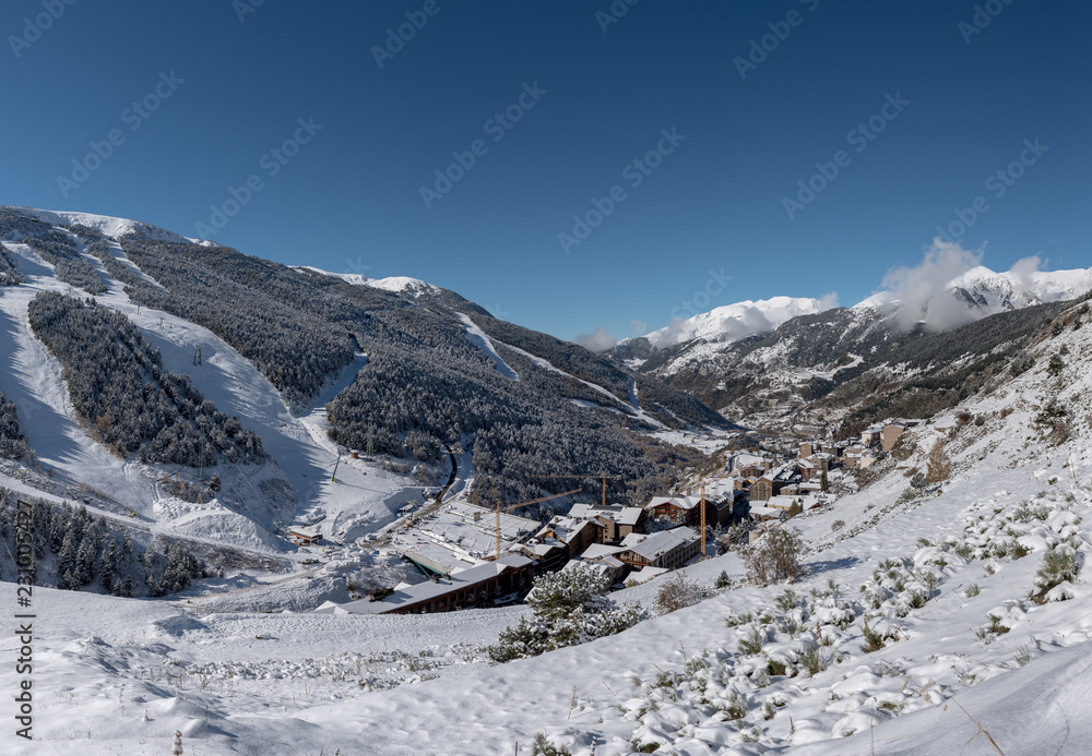 Beautiful landscape of Soldeu, Canillo, Andorra on an autumn morning in its first snowfall of the season. You can see almost completed the works of the track of the ski world cup of 2019.