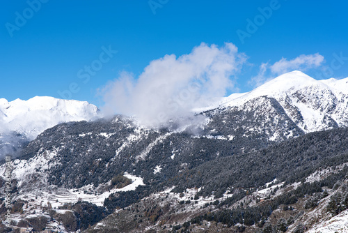 landscape of Soldeu, Canillo, Andorra on an autumn morning in its first snowfall of the season.