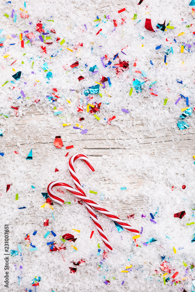 Holiday: Glass Candy Canes On Confetti Snow