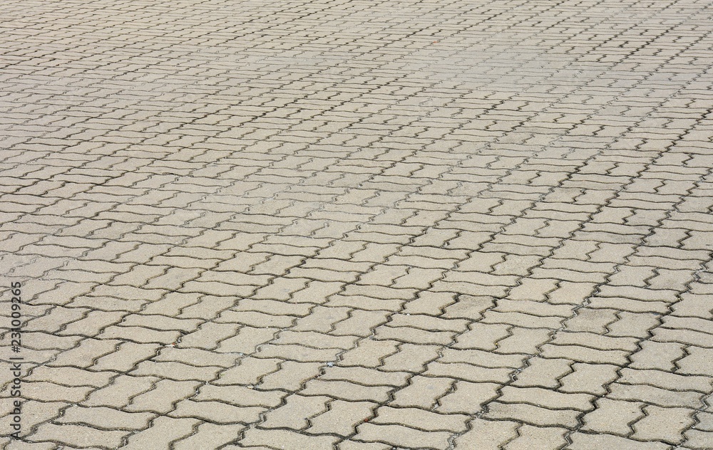 patterned paving tiles, old cement brick floor background