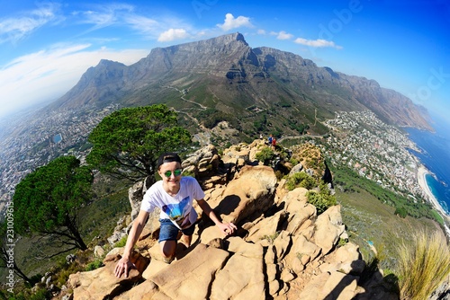 Ascent to Lion's Head overlooking Camps Bay, Table Mountain and Twelve Apostles, Cape Town, Western Cape, South Africa, Africa photo