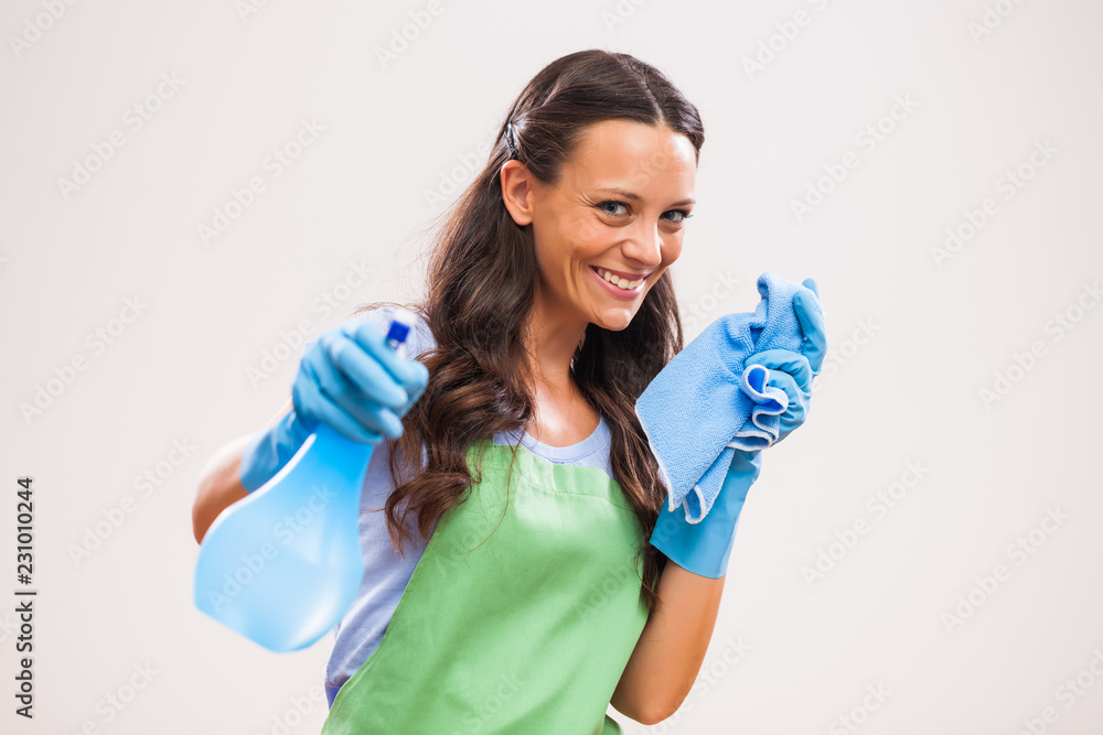 Portrait of housewife who is ready for housework. Portrait of housewife who is ready for housework.