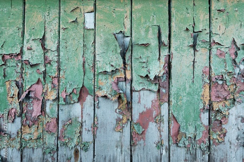 Peeling green and red paint on wooden wall, Russian miners settlement Barentsburg, Isfjorden, Spitsbergen, Svalbard and Jan Mayen, Norway, Europe photo