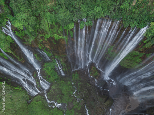 Stunning drone view of Coban Sewu waterfall in Java, Indonesia