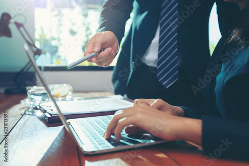 Businesswomen hands working with finance are analyzing the information to make investment decisions, with experienced business consultants. business analysis, and strategic ideas.