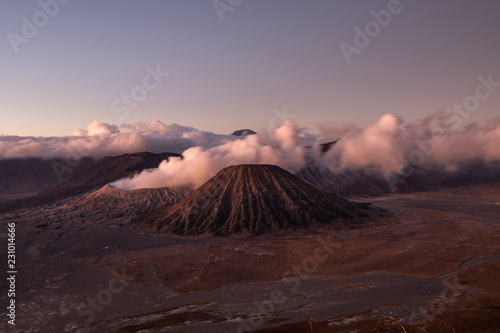 Heavy smoking coming from the Mount Bromo crater during sunrise
