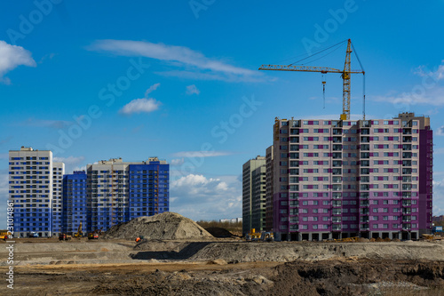 construction of apartment buildings of lilac and blue flowers