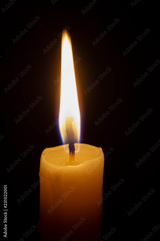a lonely burning candle in the darkness a lonely burning candle in the darkness