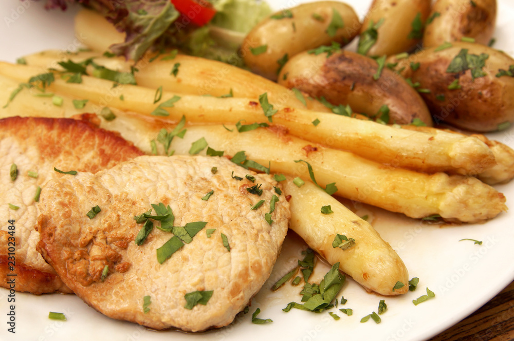 escalope with asparagus and roast potatoes escalope with asparagus and roast potatoes