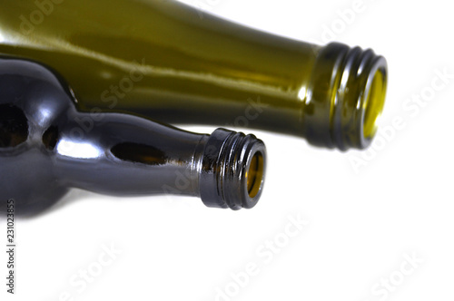 Wine bottles on white background close-up  