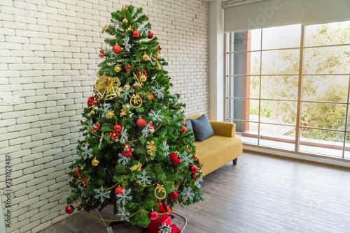 Christmas tree decorated with ornamental lights, Located in the room Ready for party and celebrate New Year in the family, to holiday concept.