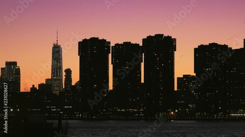 Beautiful Sunset Silhouetting One World Trade Center and NYC East Side Skyline