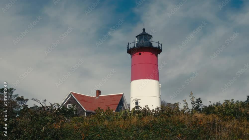 View of Nauset Light, one of the Three Sisters Lighthouses on Cape Cod, USA. 4K UHD View of Nauset Light, one of the Three Sisters Lighthouses on Cape Cod, USA. 4K UHD
