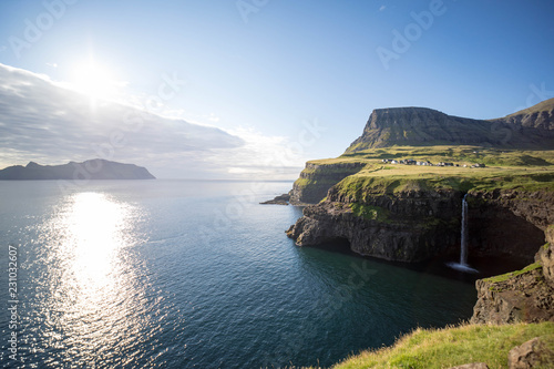 Mulafossur Waterfall with views of Gasadalur village on the Faroe Islands