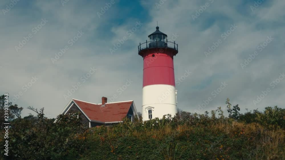 View of Nauset Light, one of the Three Sisters Lighthouses on Cape Cod, USA. 4K UHD View of Nauset Light, one of the Three Sisters Lighthouses on Cape Cod, USA. 4K UHD