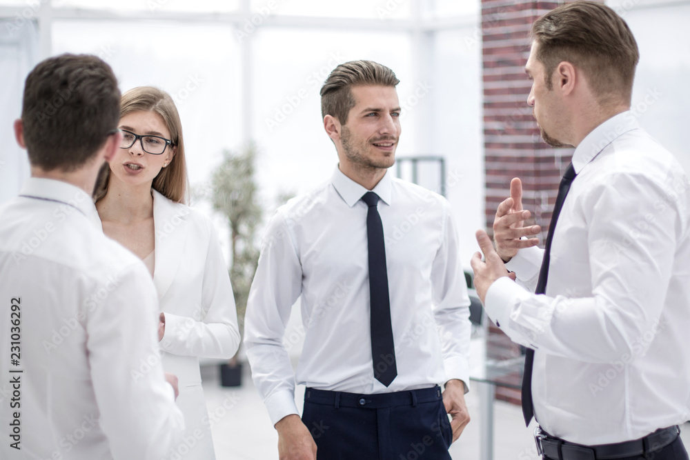 company employees discussing current tasks company employees discussing current tasks