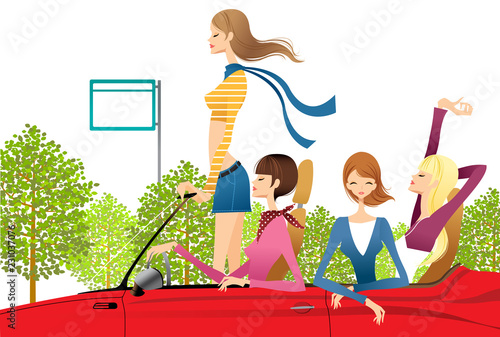 Teenage girls riding in convertible