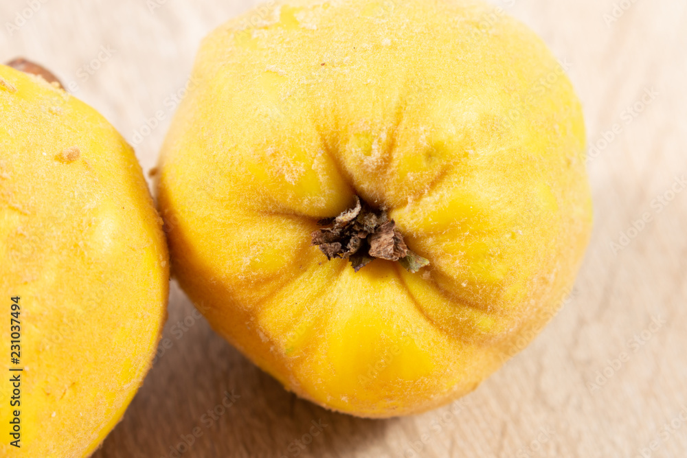 Close up of a yellow quince