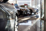 Car auto dealership. New cars at dealer showroom. Prestigious vehicles.