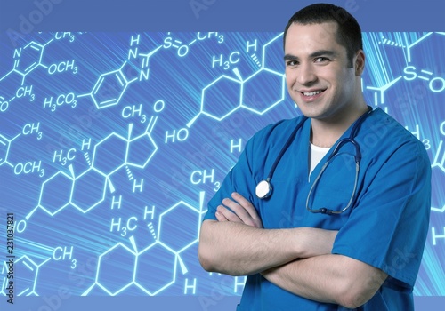 Handsome male doctor with stethoscope on neck on background