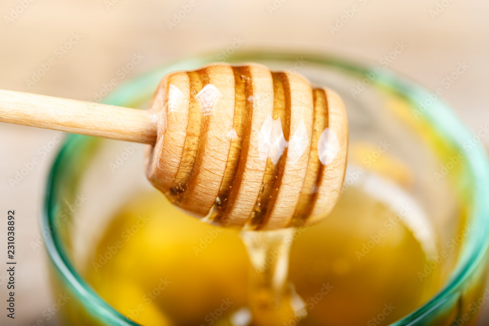honey dipper spoon with honey honey dipper spoon with honey