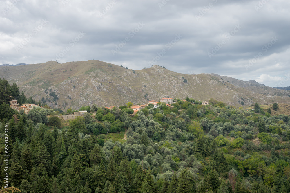 Hania, Crete - 09 26 2018: Mountain landscape Therisso. A village on the hill