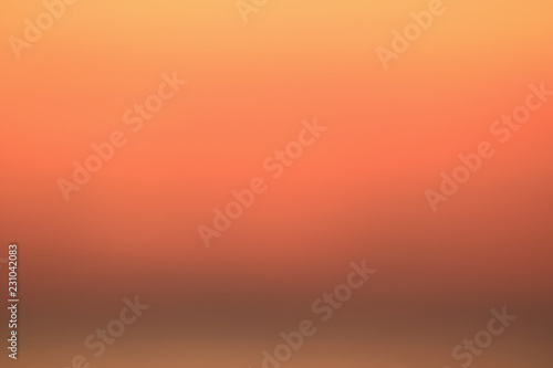 Orange color gradation of the sunrise sky in Thailand, for background or banner  © jobi_pro