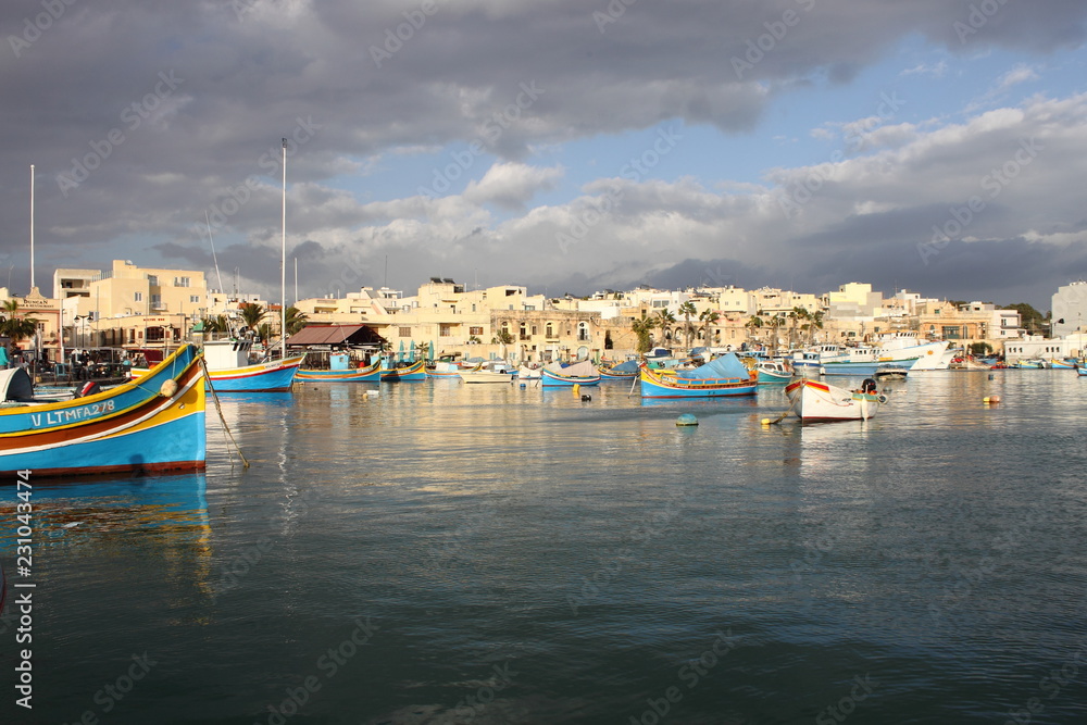 Traditional maltese fishing boat in Marsaxlokk, Malta