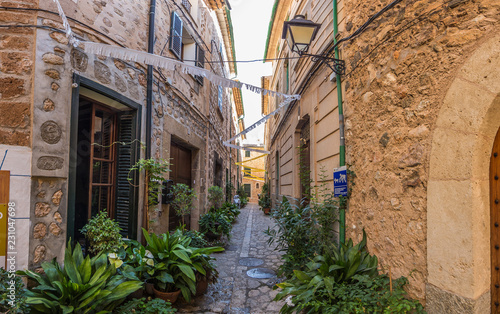Small alleay in historical town of Fornalutx on Mallorca island