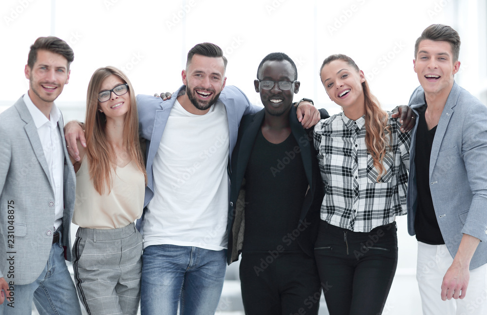 Fototapeta premium Casual group of people standing isolated over white background