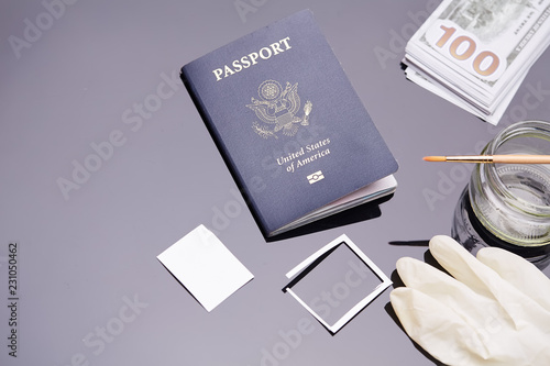 Passport of United States of American. Traveling passport. closeup of an american passport and money. Concept of counterfeiting documents.