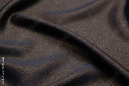 black and gold textile background