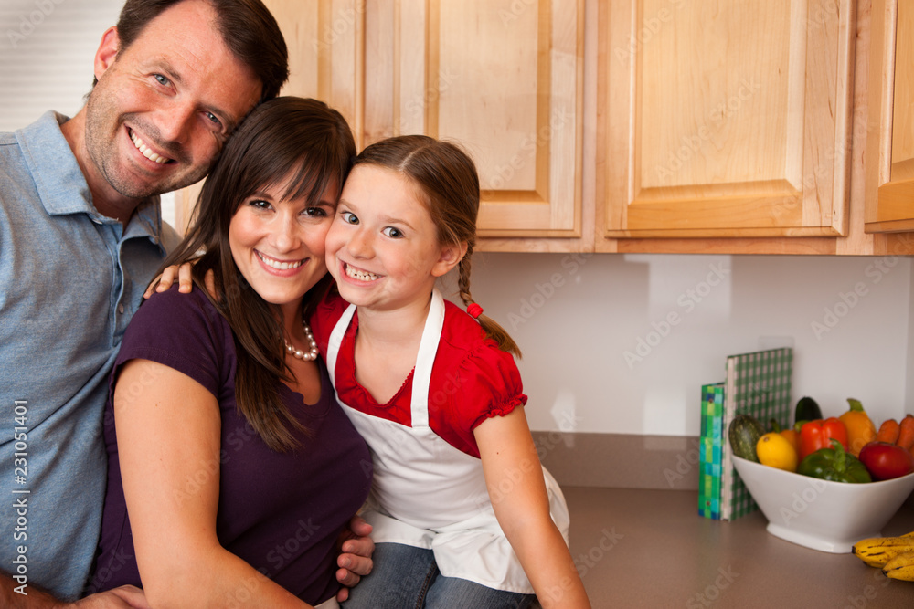 Happy Family in Kitchen at Home Happy Family in Kitchen at Home