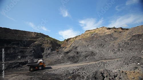 dump truck carries coal. coal pit. Quarry equipment. Big machine