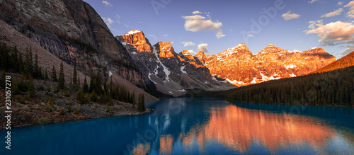 Golden Morning Light Hits Mountain Peaks at Moraine Lake