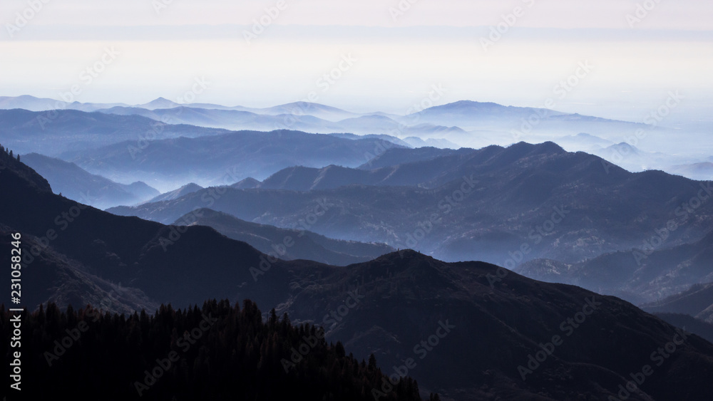 Dark view from Sequoia National Park with mountain scenery in dark blue with different shades, CA, USA
