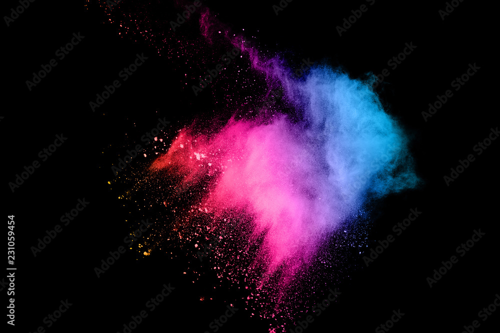 Fototapeta abstract colored dust explosion on a black background.abstract powder splatted background.