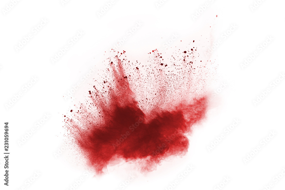 Red powder explosion on white background.