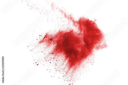 Red powder explosion on white background.