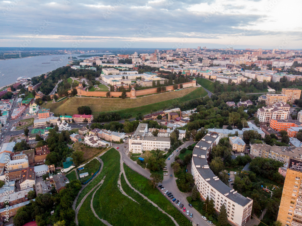 Aerial view at NIzhny Novgorod downtown with visible Kremlin, Volga river and multiple churches.