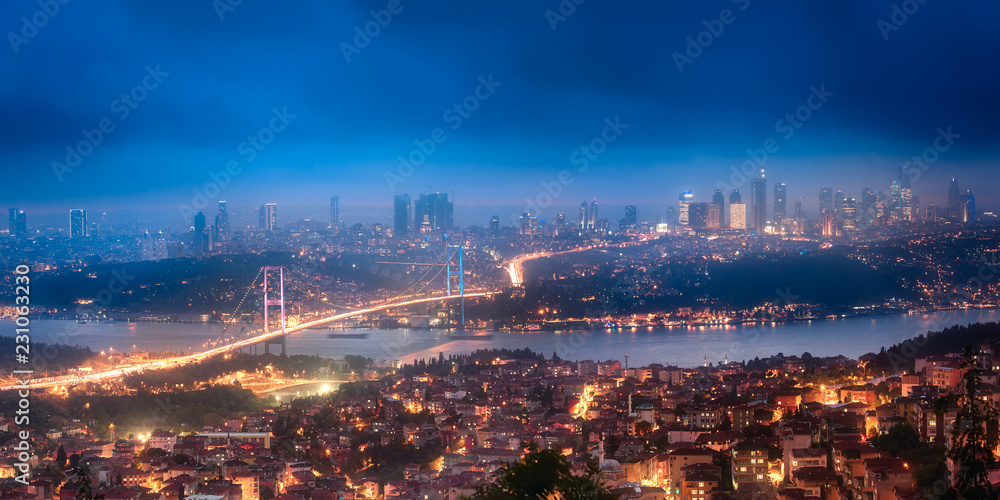 Night aerial view of Bosphorus bridge and panorama of Istanbul