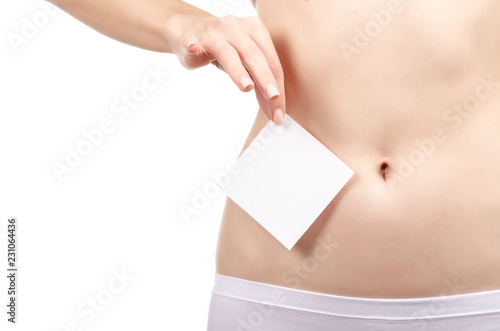 Woman health female body holding white card near stomach healthy on white background isolation